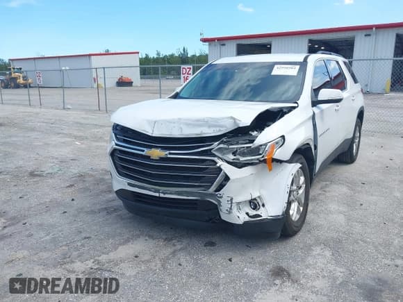 ✅ 2021 Chevrolet Traverse LT Cloth • VIN: 1GNERGKW0MJ126548 • Lot: 42998904. Wystawiony na IAAI z przebiegiem 66 776 mil. Bezpłatny archiwum sprzedaży aukcyjnych z USA i szczegółowy raport historii pojazdu na DreamBid. Zdjęcie 6.