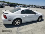 ✅ 2004 Ford Mustang Standard • VIN: 1FAFP40624F164974 • Lot: 57714955. Listed on Copart with Not provided. Free auction sales archive from the USA and detailed vehicle history report at DreamBid. Image 3.