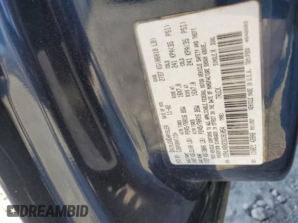 2003 Dodge Dakota SLT z VIN 1D7HL48X23S181054, wystawiony jako Copart lot #66331595 z przebiegiem 97 660 mil mil oraz Szkoda całkowita • Salvage title. Historia ofert i sprzedaży dostępna na DreamBid. Obrazek 12.