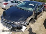 ✅ 2018 Chevrolet Cruze Premier • VIN: 3G1BF6SM2JS574550 • Lot: 62915732. Listed on Copart with 62,960 mi. Free auction sales archive from the USA and detailed vehicle history report at DreamBid. Image 2.