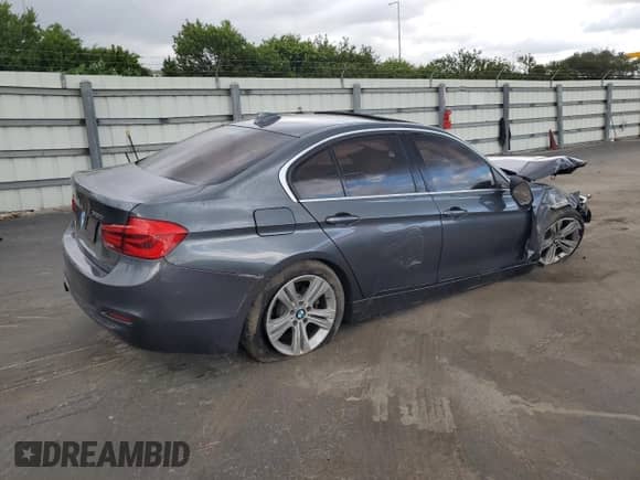 2018 BMW 3 Series 330i xDrive with VIN WBA8D9G57JNU70847, listed as a Copart auction lot 82004405 with 106,746 mi miles and Salvage title. Bid and sale history available at DreamBid. Image 3.