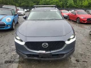 ✅ 2021 Mazda CX-30 Premium • VIN: 3MVDMBDM7MM222762 • Lot: 54825104. Wystawiony na Copart z przebiegiem 27 517 mil. Bezpłatny archiwum sprzedaży aukcyjnych z USA i szczegółowy raport historii pojazdu na DreamBid. Zdjęcie 5.
