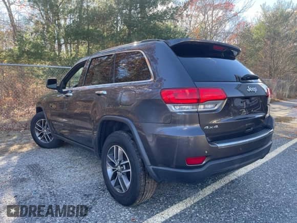 2018 Jeep Grand Cherokee Sterling z VIN 1C4RJFBG8JC162167, wystawiony jako Copart lot #91731335 z przebiegiem 128 078 mil mil oraz Czysty tytuł • Clean title. Historia ofert i sprzedaży dostępna na DreamBid. Obrazek 3.