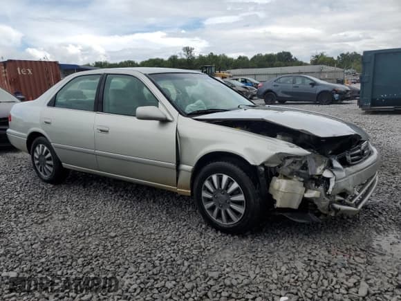 ✅ 2001 Toyota Camry LE • VIN: JT2BG22K110598298 • Lot: 68165565. Listed on Copart with 253,875 mi. Free auction sales archive from the USA and detailed vehicle history report at DreamBid. Image 4.