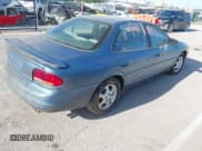 ✅ 1998 Oldsmobile Intrigue GX • VIN: 1G3WH52KXWF393882 • Lot: 42056782. Listed on IAAI with 223,763 mi. Free auction sales archive from the USA and detailed vehicle history report at DreamBid. Image 4.