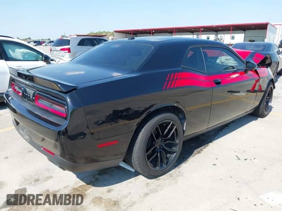 2018 Dodge Challenger SXT Plus with VIN 2C3CDZAG3JH241537, listed as a IAAI auction lot 43054145 with 102,274 mi miles and . Bid and sale history available at DreamBid. Image 4.