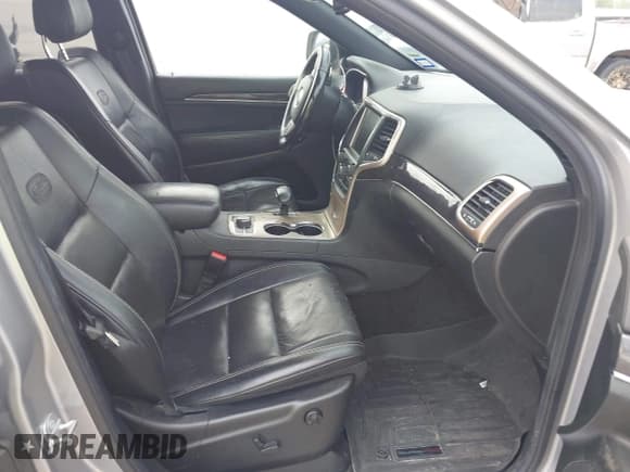 ✅ 2015 Jeep Grand Cherokee Overland • VIN: 1C4RJFCMXFC725683 • Lot: 41960837. Listed on IAAI with 117,200 mi. Free auction sales archive from the USA and detailed vehicle history report at DreamBid. Image 5.
