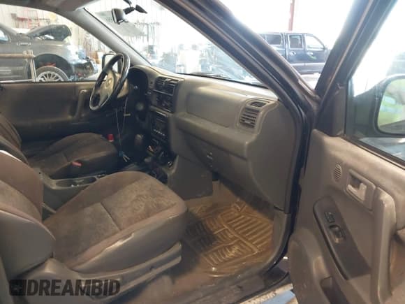 ✅ 2002 Isuzu Rodeo • VIN: 4S2CM57W124335034 • Lot: 42446556. Listed on IAAI with 214,718 mi. Free auction sales archive from the USA and detailed vehicle history report at DreamBid. Image 5.