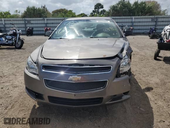 2011 Chevrolet Malibu 1LS z VIN 1G1ZB5E17BF171739, wystawiony jako Copart lot #63230574 z przebiegiem 153 931 mil mil oraz Szkoda całkowita • Salvage title. Historia ofert i sprzedaży dostępna na DreamBid. Obrazek 5.