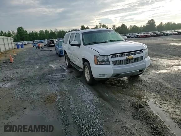 ✅ 2013 Chevrolet Suburban LT • VIN: 1GNSCJE06DR203594 • Lot: 63114724. Wystawiony na Copart z przebiegiem 263 456 mil. Bezpłatny archiwum sprzedaży aukcyjnych z USA i szczegółowy raport historii pojazdu na DreamBid. Zdjęcie 11.