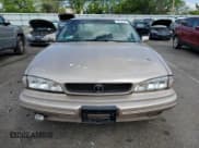 ✅ 1994 Pontiac Bonneville SE • VIN: 1G2HX52L8R4280540 • Lot: 52730244. Wystawiony na Copart z przebiegiem 164 728 mil. Bezpłatny archiwum sprzedaży aukcyjnych z USA i szczegółowy raport historii pojazdu na DreamBid. Zdjęcie 5.