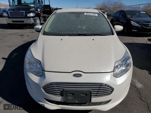 ✅ 2012 Ford Focus Electric • VIN: 1FAHP3R44CL437949 • Лот: 42241745. Опубликован ранее на Copart с пробегом 58 828 миль. Бесплатный доступ к архиву аукционных продаж из США и подробный отчёт об истории автомобиля на DreamBid. Изображение 5.