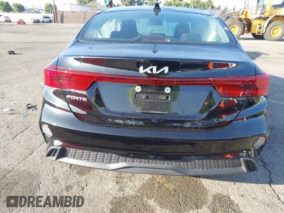 ✅ 2023 Kia Forte LXS • VIN: 3KPF24AD9PE552921 • Lot: 43792222. Listed on IAAI with 28,803 mi. Free auction sales archive from the USA and detailed vehicle history report at DreamBid. Image 16.