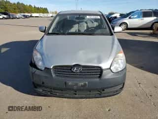 2010 Hyundai Accent GLS z VIN KMHCN4AC6AU430832, wystawiony jako Copart lot #75715324 z przebiegiem 124 600 mil mil oraz Szkoda całkowita • Salvage title. Historia ofert i sprzedaży dostępna na DreamBid. Obrazek 5.