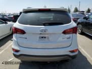 ✅ 2017 Hyundai Santa Fe Ultimate • VIN: 5XYZW4LA8HG448493 • Лот: 48143503. Опубликован ранее на Copart с пробегом 88 780 миль. Бесплатный доступ к архиву аукционных продаж из США и подробный отчёт об истории автомобиля на DreamBid. Изображение 6.
