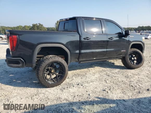 ✅ 2022 GMC Sierra 1500 AT4 • VIN: 1GTP9EEL9NZ121911 • Lot: 81358955. Listed on Copart with 33,958 mi. Free auction sales archive from the USA and detailed vehicle history report at DreamBid. Image 3.
