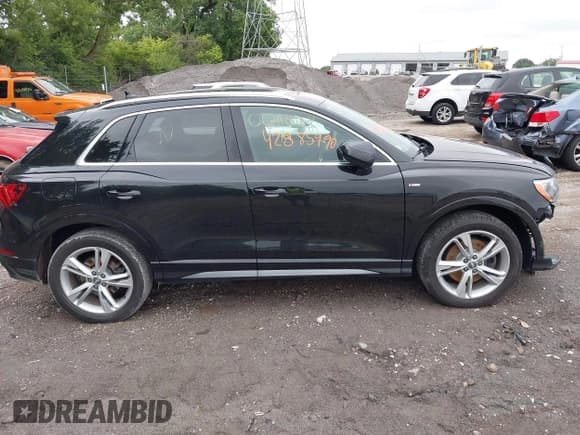✅ 2021 Audi Q3 S line Premium • VIN: WA1DECF3XM1004668 • Lot: 42885990. Wystawiony na IAAI z przebiegiem 88 064 mil. Bezpłatny archiwum sprzedaży aukcyjnych z USA i szczegółowy raport historii pojazdu na DreamBid. Zdjęcie 13.
