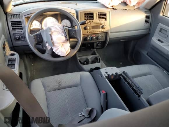 2007 Dodge Dakota ST z VIN 1D7HW28PX7S265270, wystawiony jako Copart lot #78265494 z przebiegiem 154 418 mil mil oraz Szkoda całkowita • Salvage title. Historia ofert i sprzedaży dostępna na DreamBid. Obrazek 8.