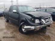 ✅ 2001 Ford F-150 • VIN: 2FTZX17291CA01495 • Lot: 79252354. Listed on Copart with Not provided. Free auction sales archive from the USA and detailed vehicle history report at DreamBid. Image 4.