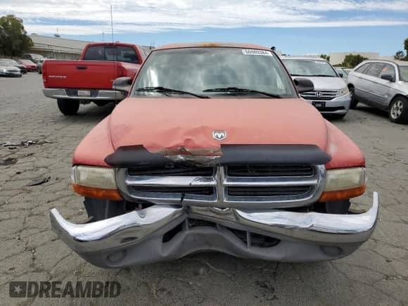 1997 Dodge Dakota z VIN 1B7GL23XXVS265918, wystawiony jako Copart lot #66989384 z przebiegiem 197 880 mil mil oraz Szkoda całkowita • Salvage title. Historia ofert i sprzedaży dostępna na DreamBid. Obrazek 5.