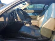 ✅ 2004 Jaguar XK • VIN: SAJDA42B443A38098 • Lot: 77311844. Listed on Copart with Not provided. Free auction sales archive from the USA and detailed vehicle history report at DreamBid. Image 7.