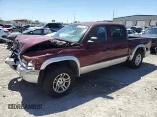 ✅ 2003 Dodge Dakota SLT • VIN: 1D7HL48X13S201942 • Lot: 57829145. Wystawiony na Copart z przebiegiem 212 912 mil. Bezpłatny archiwum sprzedaży aukcyjnych z USA i szczegółowy raport historii pojazdu na DreamBid. Zdjęcie 1.