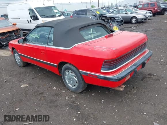 ✅ 1990 Chrysler LeBaron • VIN: 1C3XJ4536LG419900 • Lot: 42440988. Listed on IAAI with 132,496 mi. Free auction sales archive from the USA and detailed vehicle history report at DreamBid. Image 3.