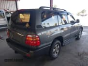 ✅ 1999 Toyota Land Cruiser • VIN: JT3HT05J1X0064266 • Lot: 42768432. Listed on IAAI with 246,931 mi. Free auction sales archive from the USA and detailed vehicle history report at DreamBid. Image 4.