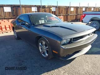 2013 Dodge Challenger SXT with VIN 2C3CDYAG0DH651095, listed as a IAAI auction lot 43558284 with Not provided miles and . Bid and sale history available at DreamBid. Image 1.
