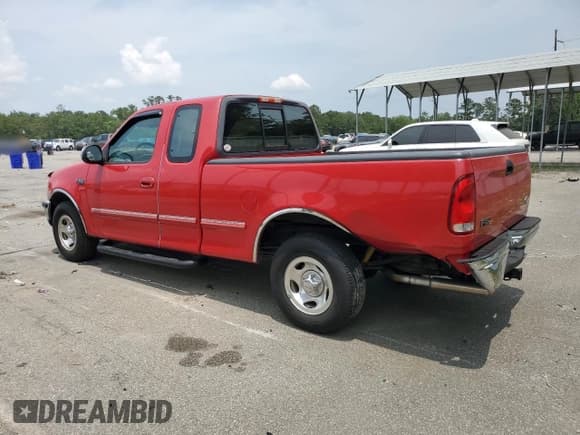 ✅ 1997 Ford F-150 XL • VIN: 1FTEX17L1VNB55769 • Lot: 58901715. Wystawiony na Copart z przebiegiem 174 234 mil. Bezpłatny archiwum sprzedaży aukcyjnych z USA i szczegółowy raport historii pojazdu na DreamBid. Zdjęcie 2.