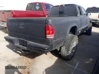✅ 2000 Dodge Dakota SLT • VIN: 1B7GG22X1YS655459 • Lot: 84569564. Wystawiony na Copart z przebiegiem 240 478 mil. Bezpłatny archiwum sprzedaży aukcyjnych z USA i szczegółowy raport historii pojazdu na DreamBid. Zdjęcie 3.