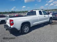 ✅ 2021 Toyota Tundra SR • VIN: 5TFCY5F10MX027263 • Lot: 42963423. Listed on IAAI with 27,429 mi. Free auction sales archive from the USA and detailed vehicle history report at DreamBid. Image 4.