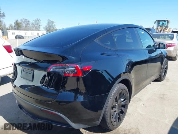 ✅ 2022 Tesla Model Y Long Range • VIN: 7SAYGDEE8NF346352 • Lot: 42649343. Listed on IAAI with 36,799 mi. Free auction sales archive from the USA and detailed vehicle history report at DreamBid. Image 4.