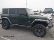 ✅ 2007 Jeep Wrangler Unlimited Sahara • VIN: 1J4GA59147L218594 • Lot: 42984397. Listed on IAAI with 108,296 mi. Free auction sales archive from the USA and detailed vehicle history report at DreamBid. Image 14.