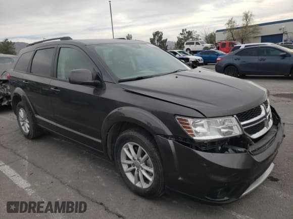 ✅ 2017 Dodge Journey SXT • VIN: 3C4PDDBG4HT654003 • Lot: 66204752. Listed on Copart with 87,919 mi. Free auction sales archive from the USA and detailed vehicle history report at DreamBid. Image 4.