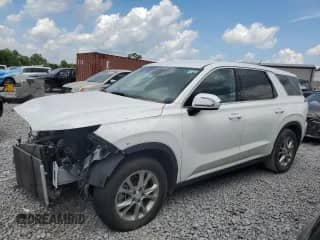2022 Hyundai Palisade SE z VIN KM8R14HE2NU440017, wystawiony jako Copart lot #63863105 z przebiegiem 124 405 mil mil oraz Szkoda całkowita • Salvage title. Historia ofert i sprzedaży dostępna na DreamBid. Obrazek 1.