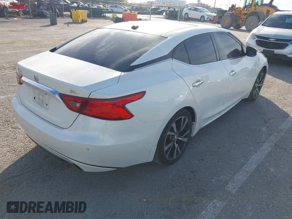 ✅ 2017 Nissan Maxima Platinum • VIN: 1N4AA6AP7HC434383 • Lot: 43277526. Listed on IAAI with 83,731 mi. Free auction sales archive from the USA and detailed vehicle history report at DreamBid. Image 4.