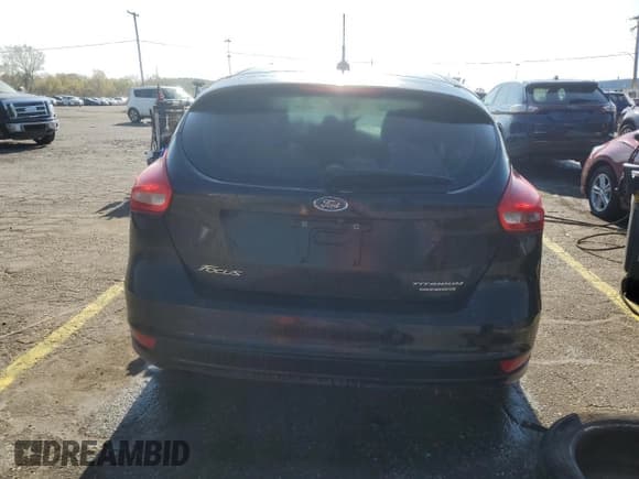 ✅ 2015 Ford Focus Titanium • VIN: 1FADP3N2XFL230263 • Lot: 86443185. Wystawiony na Copart z przebiegiem Nie podano. Bezpłatny archiwum sprzedaży aukcyjnych z USA i szczegółowy raport historii pojazdu na DreamBid. Zdjęcie 6.