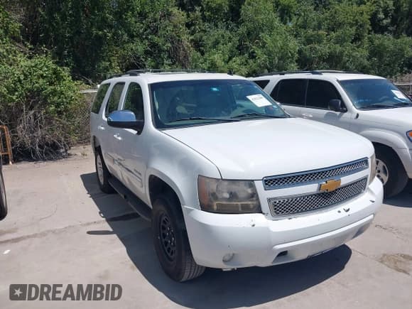 ✅ 2014 Chevrolet Tahoe LT • VIN: 1GNSCBE03ER213054 • Lot: 42821489. Listed on IAAI with 166,689 mi. Free auction sales archive from the USA and detailed vehicle history report at DreamBid. Image 1.