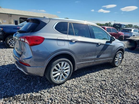 ✅ 2020 Buick Envision Premium • VIN: LRBFX3SX4LD104682 • Лот: 86130335. Опубликован ранее на Copart с пробегом 77 472 миль. Бесплатный доступ к архиву аукционных продаж из США и подробный отчёт об истории автомобиля на DreamBid. Изображение 3.