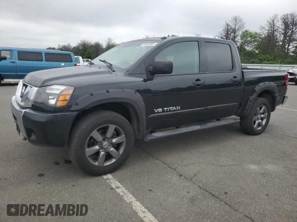 ✅ 2015 Nissan Titan SV • VIN: 1N6AA0EC2FN503980 • Lot: 64664665. Listed on Copart with 124,589 mi. Free auction sales archive from the USA and detailed vehicle history report at DreamBid. Image 1.