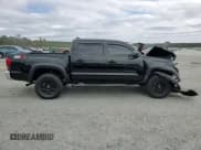 ✅ 2023 Toyota Tacoma SR5 • VIN: 3TYAZ5CN8PT031801 • Lot: 86067835. Listed on Copart with 27,793 mi. Free auction sales archive from the USA and detailed vehicle history report at DreamBid. Image 14.