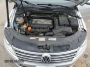 ✅ 2015 Volkswagen CC R-Line • VIN: WVWBN7AN5FE817893 • Lot: 89400875. Listed on Copart with 154,105 mi. Free auction sales archive from the USA and detailed vehicle history report at DreamBid. Image 11.