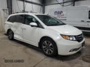 ✅ 2014 Honda Odyssey Touring • VIN: 5FNRL5H92EB024775 • Lot: 91608255. Listed on Copart with 167,473 mi. Free auction sales archive from the USA and detailed vehicle history report at DreamBid. Image 4.