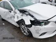 ✅ 2014 Mazda 6 i Grand Touring • VIN: JM1GJ1W67E1118643 • Lot: 43604649. Listed on IAAI with 147,515 mi. Free auction sales archive from the USA and detailed vehicle history report at DreamBid. Image 6.