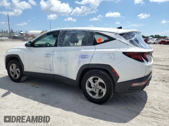 ✅ 2022 Hyundai Tucson SE • VIN: 5NMJACAE7NH023019 • Лот: 64854244. Опубликован ранее на Copart с пробегом Не указан. Бесплатный доступ к архиву аукционных продаж из США и подробный отчёт об истории автомобиля на DreamBid. Изображение 2.