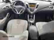2012 Hyundai Veloster w/Gray Int с VIN KMHTC6AD8CU037430, выставлен на аукционе Copart как лот 69676955 с пробегом 115 290 миль миль и Списание • Salvage title. История ставок и продаж доступна на DreamBid. Изображение 8.