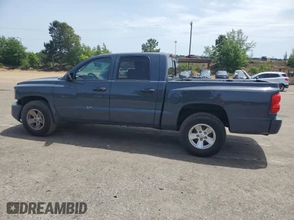 2008 Dodge Dakota SLT с VIN 1D7HE48K68S501871, выставлен на аукционе Copart как лот 54688015 с пробегом 152 712 миль миль и Списание • Salvage title. История ставок и продаж доступна на DreamBid. Изображение 2.