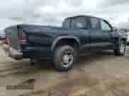 2003 Dodge Dakota z VIN 1D7HL12X83S102980, wystawiony jako Copart lot #72816614 z przebiegiem 138 422 mil mil oraz Czysty tytuł • Clean title. Historia ofert i sprzedaży dostępna na DreamBid. Obrazek 3.