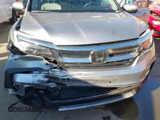 ✅ 2022 Honda Pilot EX-L • VIN: 5FNYF5H54NB037737 • Lot: 43429957. Wystawiony na IAAI z przebiegiem 26 170 mil. Bezpłatny archiwum sprzedaży aukcyjnych z USA i szczegółowy raport historii pojazdu na DreamBid. Zdjęcie 6.